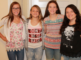 TrialNet participant Hollie Shereyk poses with her 3 sisters standing in front of a doorway